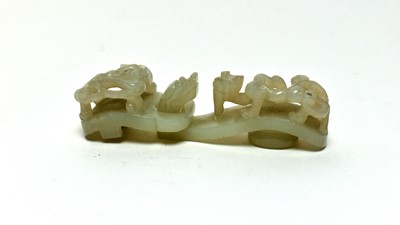 Lot 784 - Jade belt hook and another