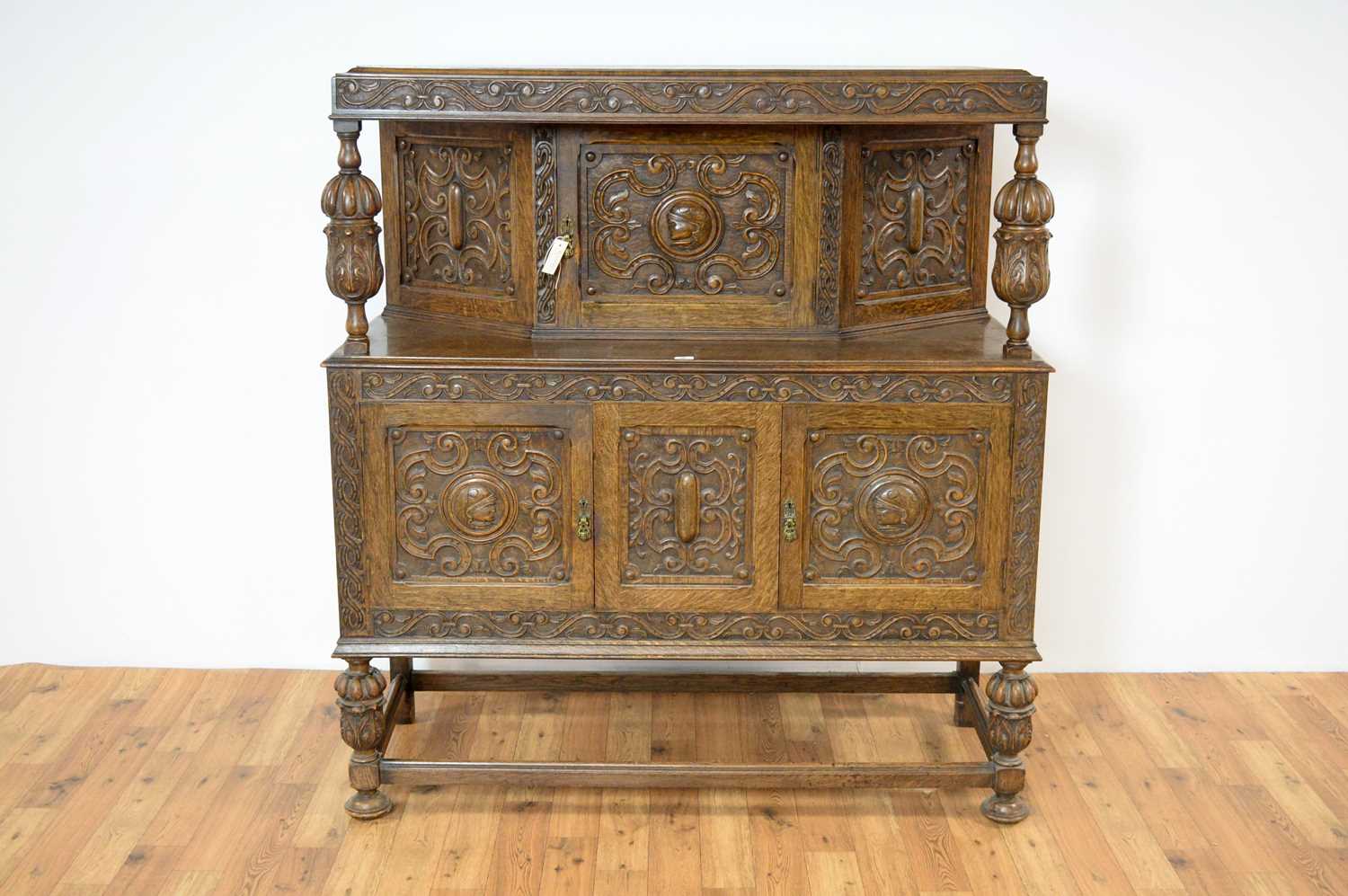 Lot 40 - A mid 20th century Jacobean Revival carved oak buffet