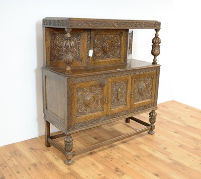 Lot 40 - A mid 20th century Jacobean Revival carved oak buffet