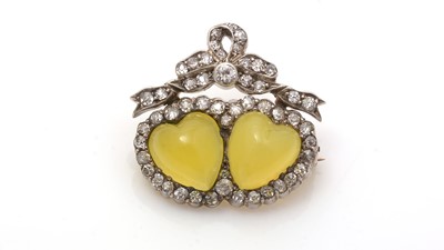 Lot 704 - A Victorian yellow chalcedony and diamond brooch