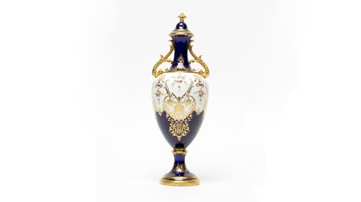 Lot 906 - A Coalport bone china vase and cover