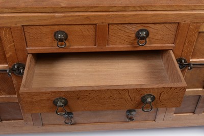 Lot 1335 - Robert 'Mouseman' Thompson of Kilburn: a 1950's 5' panelled English oak sideboard
