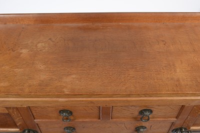 Lot 1335 - Robert 'Mouseman' Thompson of Kilburn: a 1950's 5' panelled English oak sideboard