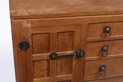 Lot 1335 - Robert 'Mouseman' Thompson of Kilburn: a 1950's 5' panelled English oak sideboard