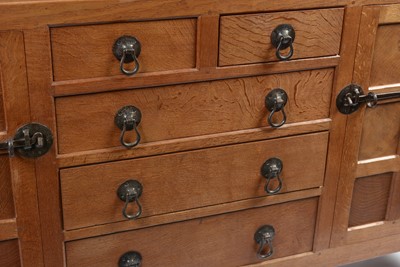 Lot 1335 - Robert 'Mouseman' Thompson of Kilburn: a 1950's 5' panelled English oak sideboard