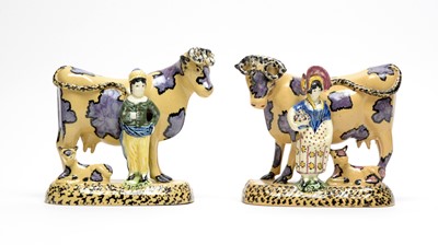 Lot 898 - Pair of South Yorkshire pottery Cow groups