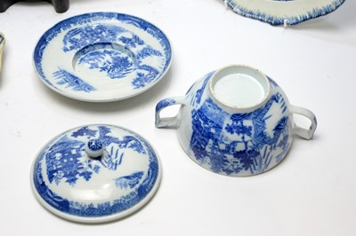 Lot 896 - Pearlware charger, three plates, écuelle cover and stand