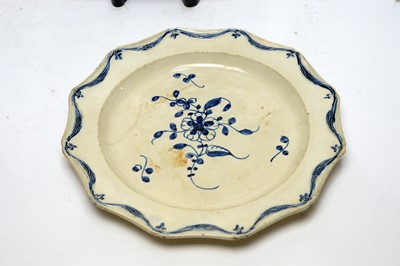 Lot 896 - Pearlware charger, three plates, écuelle cover and stand