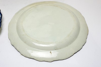 Lot 896 - Pearlware charger, three plates, écuelle cover and stand