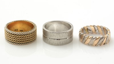Lot 176 - A platinum wedding band and two other rings