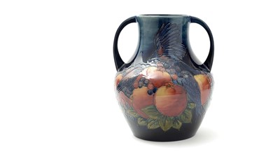 Lot 117 - Moorcroft 'Finch and Berry' twin handles vase