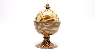 Lot 894 - Agate and slipware wassail bowl and cover
