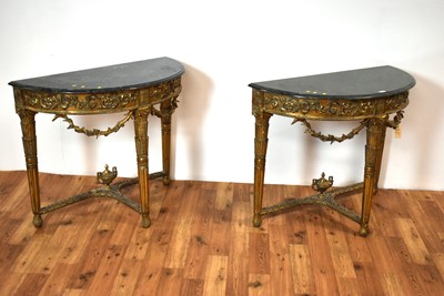 Lot 16 - Pair of ornate Georgian style marble-topped and gold painted demi lune console tables