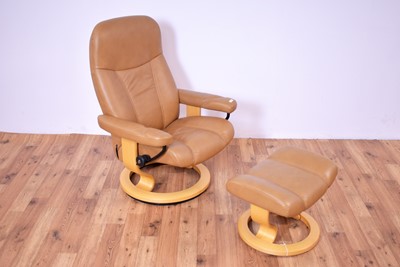 Lot 6 - A contemporary Scandinavian Ekornes Stressless reclining armchair and matching ottoman