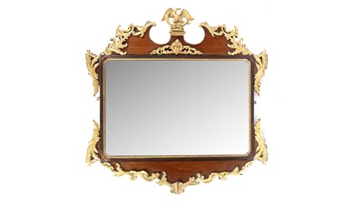 Lot 1310 - An ornate late 19th Century giltwood and mahogany wall mirror