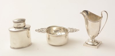 Lot 112 - Silver tea caddy, strainer and milk jug