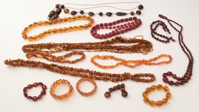 Lot 177 - A selection of amber, reconstituted amber and simulated-amber jewellery