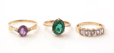 Lot 147 - An amethyst and diamond ring and two other rings