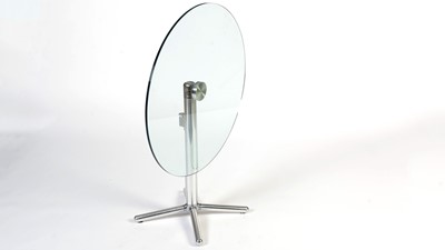 Lot 27 - A contemporary chrome and glass tilt action table / Fritz Hansen - Ice dining chair by Kaspar Salto