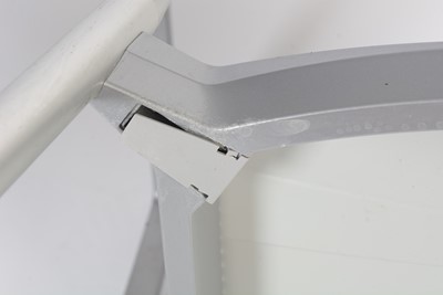 Lot 27 - A contemporary chrome and glass tilt action table / Fritz Hansen - Ice dining chair by Kaspar Salto