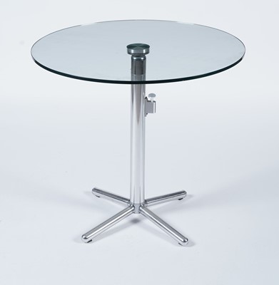 Lot 27 - A contemporary chrome and glass tilt action table / Fritz Hansen - Ice dining chair by Kaspar Salto