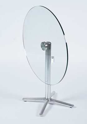Lot 27 - A contemporary chrome and glass tilt action table / Fritz Hansen - Ice dining chair by Kaspar Salto