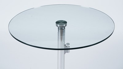 Lot 27 - A contemporary chrome and glass tilt action table / Fritz Hansen - Ice dining chair by Kaspar Salto