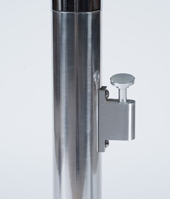 Lot 27 - A contemporary chrome and glass tilt action table / Fritz Hansen - Ice dining chair by Kaspar Salto