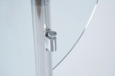 Lot 27 - A contemporary chrome and glass tilt action table / Fritz Hansen - Ice dining chair by Kaspar Salto
