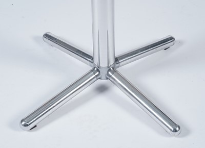 Lot 27 - A contemporary chrome and glass tilt action table / Fritz Hansen - Ice dining chair by Kaspar Salto