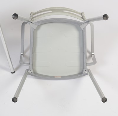 Lot 27 - A contemporary chrome and glass tilt action table / Fritz Hansen - Ice dining chair by Kaspar Salto