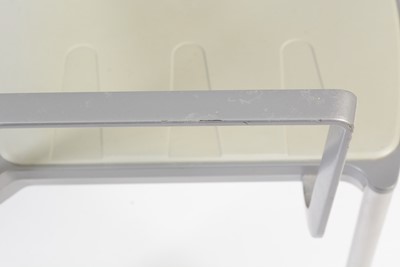 Lot 27 - A contemporary chrome and glass tilt action table / Fritz Hansen - Ice dining chair by Kaspar Salto