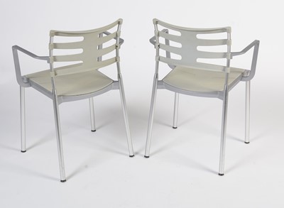 Lot 27 - A contemporary chrome and glass tilt action table / Fritz Hansen - Ice dining chair by Kaspar Salto