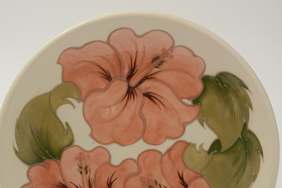 Lot 100 - Moorcroft Hibiscus bowl and cover, plate and small bowl