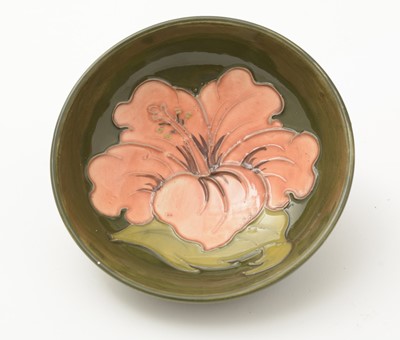 Lot 100 - Moorcroft Hibiscus bowl and cover, plate and small bowl