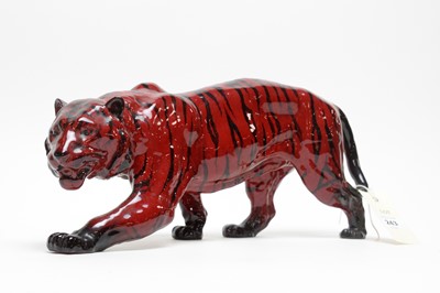 Lot 243 - A Royal Doulton flambe tiger
