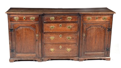 Lot 937 - An 18th Century oak breakfront dresser base