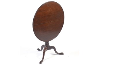 Lot 1441 - A George III mahogany tripod tilt action table