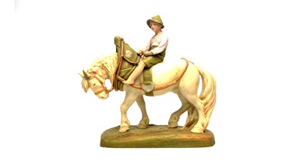 Lot 943 - Royal Dux figure Boy and Carthorse