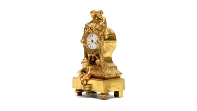 Lot 872 - A decorative cast gilt brass boudoir clock