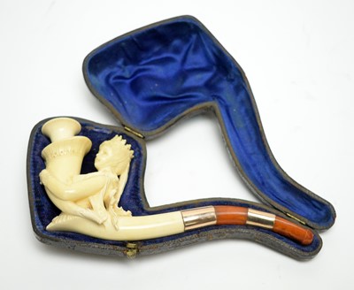Lot 704 - A 19th Century unused carved meerschaum pipe