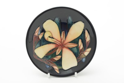 Lot 103 - Four small Moorcroft dishes boxed