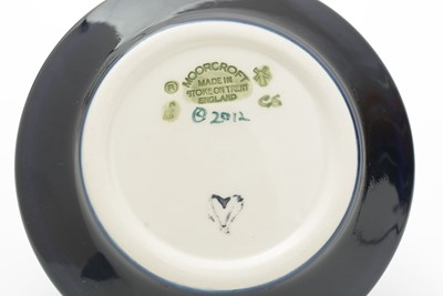 Lot 103 - Four small Moorcroft dishes boxed