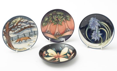 Lot 103 - Four small Moorcroft dishes boxed