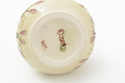 Lot 105 - Moorcroft pin tray, another. two small vases and an enamel box.