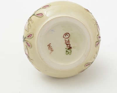 Lot 105 - Moorcroft pin tray, another. two small vases and an enamel box.