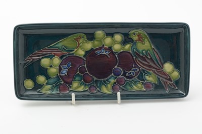 Lot 105 - Moorcroft pin tray, another. two small vases and an enamel box.