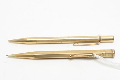 Lot 143 - Two 9ct yellow gold pencils
