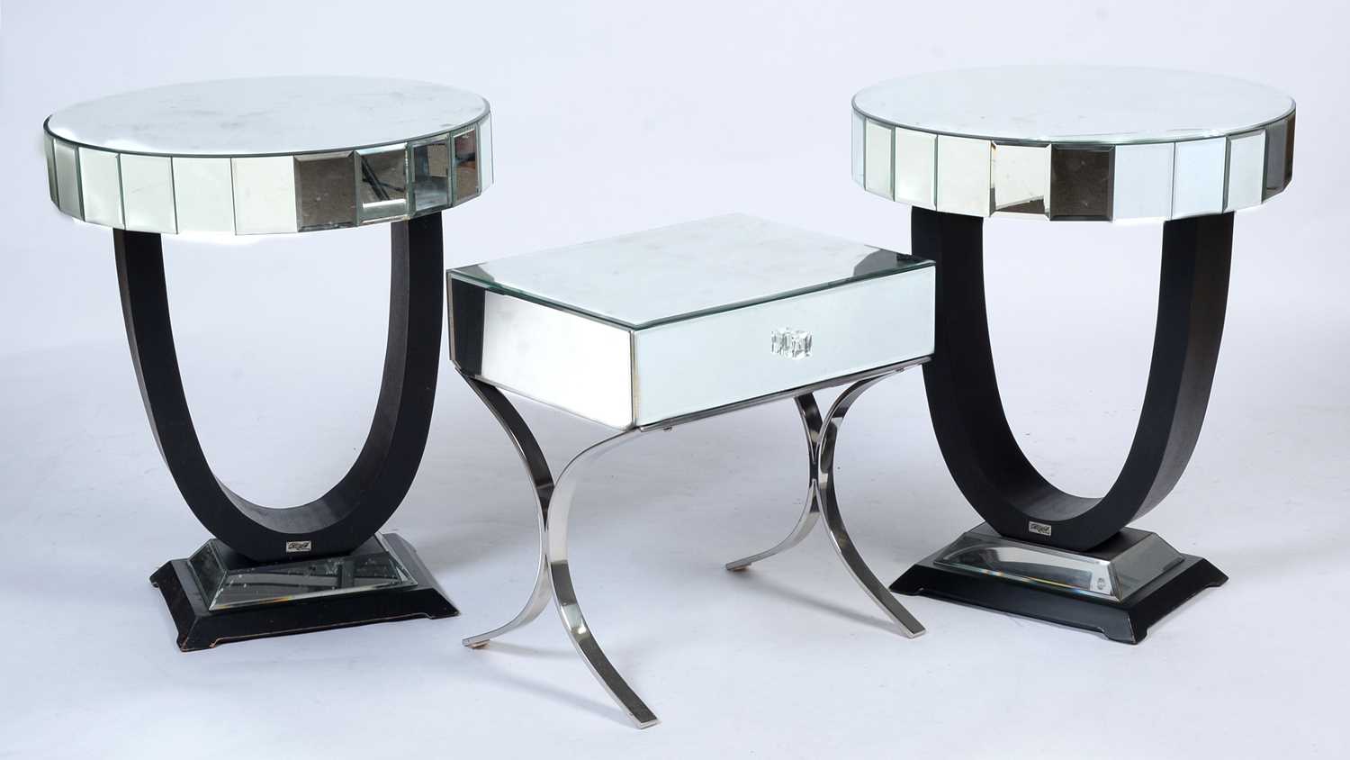 Lot 24 - A pair of glass and ebonised wood occasional tables
