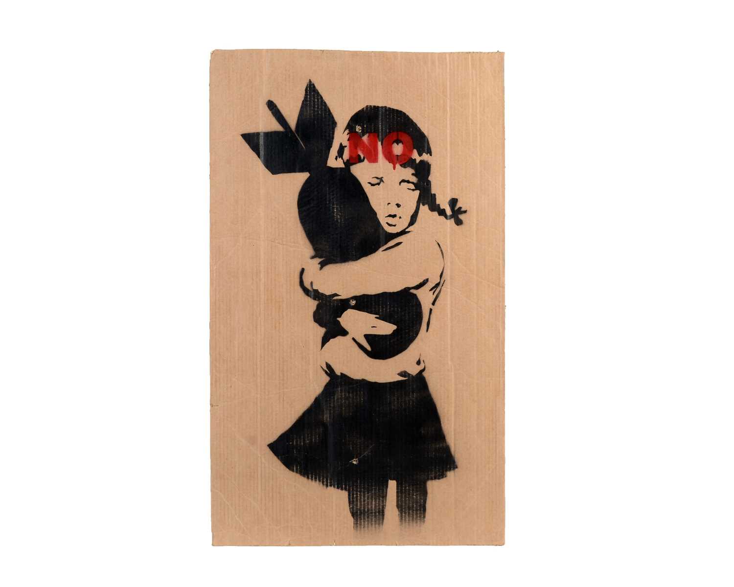 Lot 141 - BANKSY - "Bomb Hugger" Anti-Iraq War Protest March Plaqard | spray paint on cardboard